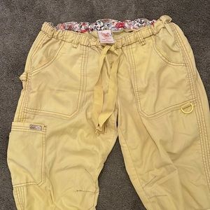 Women’s yellow koi scrub pants